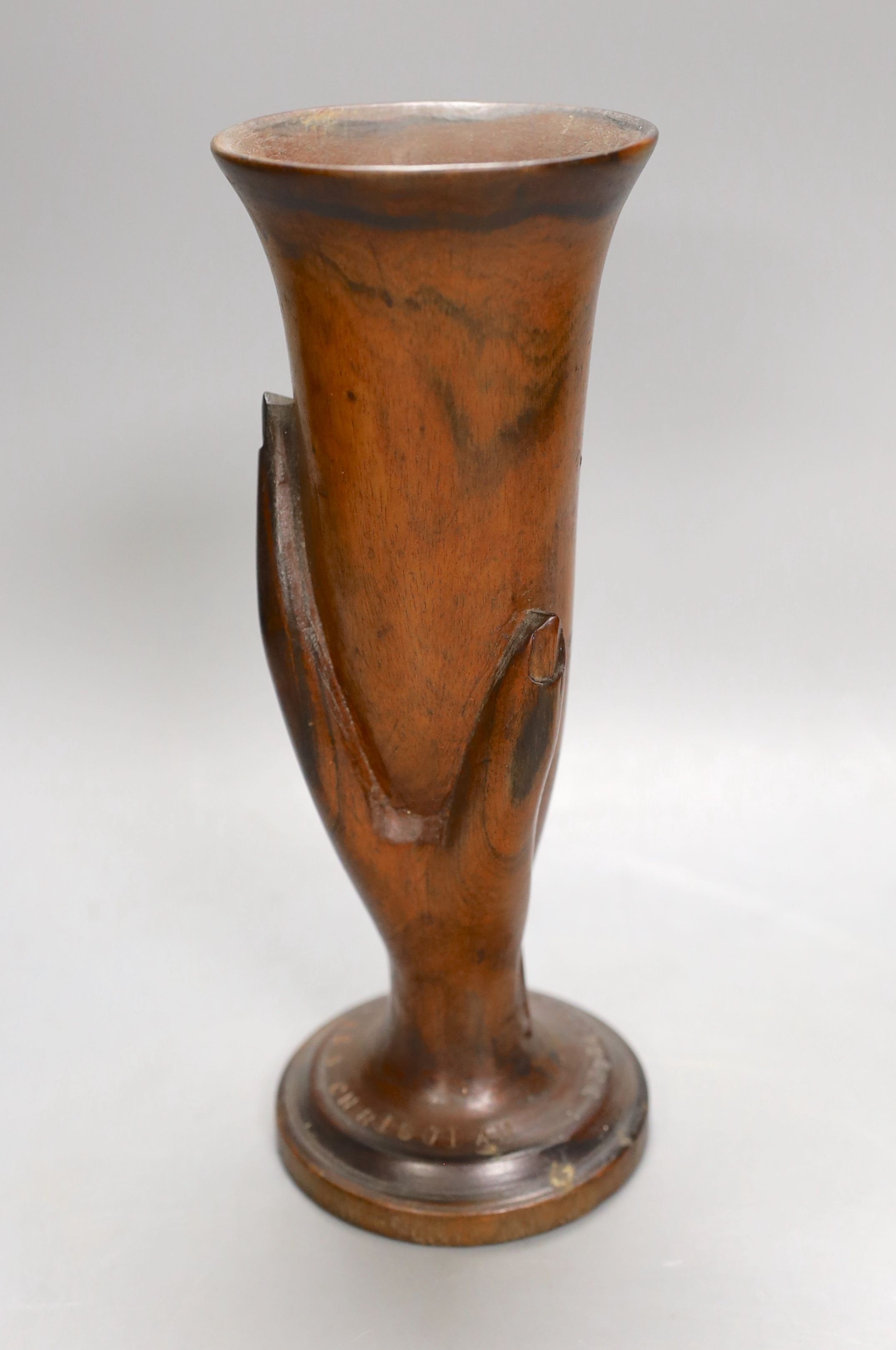 A wooden vase 'Ben Christian Pitcairn Island', approx 24 cms high.